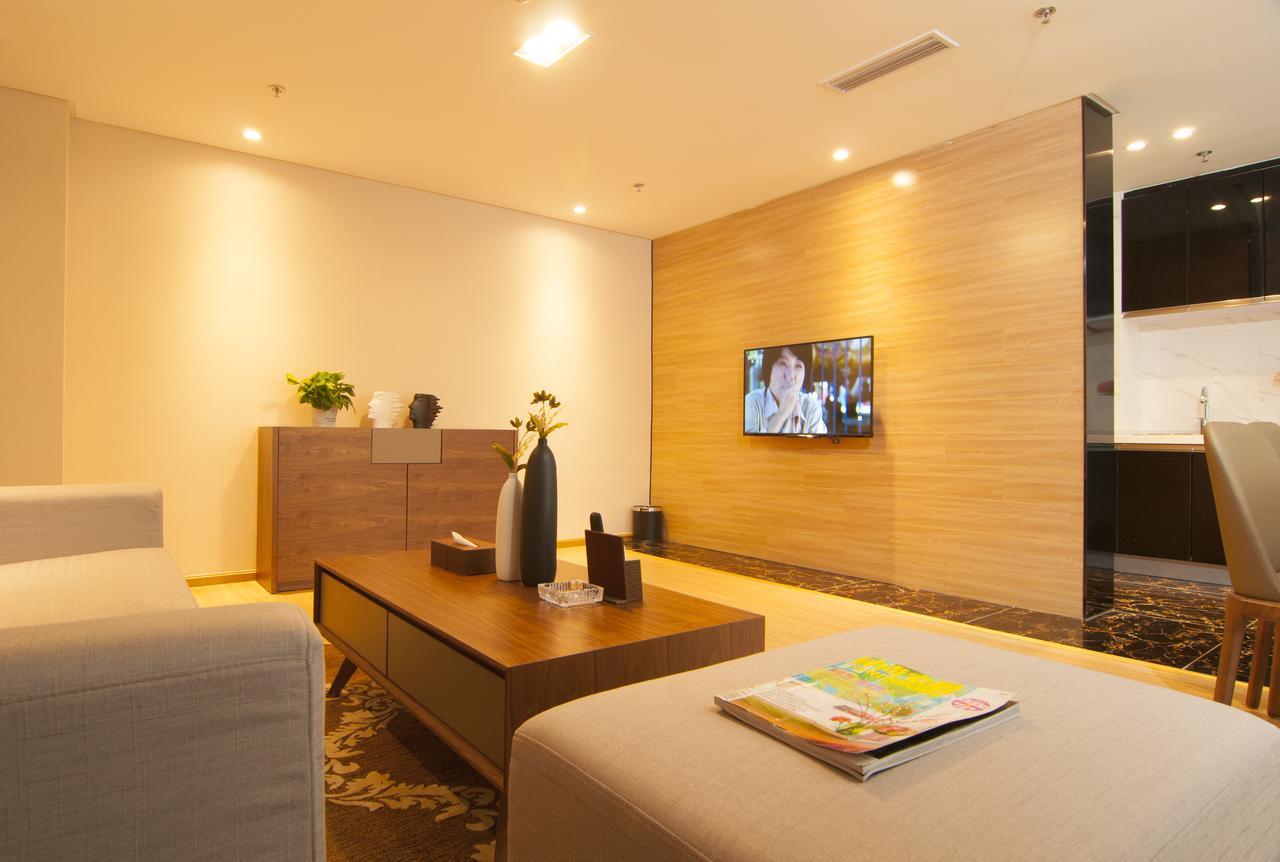 Home Plus Suite Hotel And Apartment Wuhan Bagian luar foto
