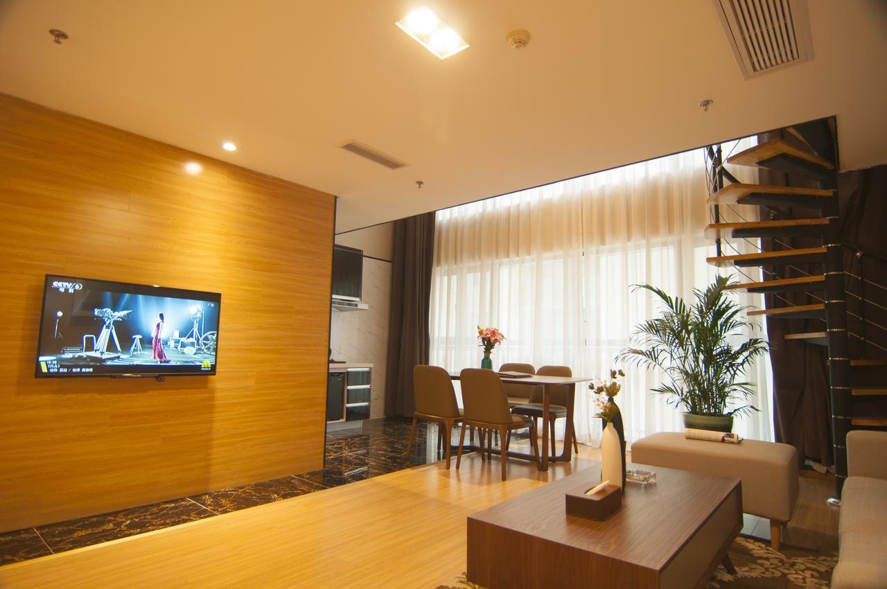 Home Plus Suite Hotel And Apartment Wuhan Bagian luar foto
